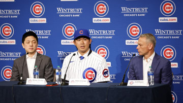 Jan 12, 2024; Chicago, IL, USA; Chicago Cubs newly signed pitcher Shota Imanaga (center) speaks