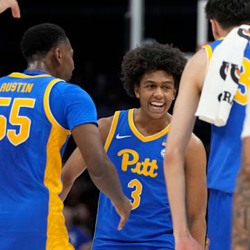 Mar 11, 2025; Charlotte, NC, USA; Pittsburgh Panthers guard Brandin Cummings (3) reacts after hitting a three point shot in the second half at Spectrum Center. Mandatory Credit: Bob Donnan-Imagn Images