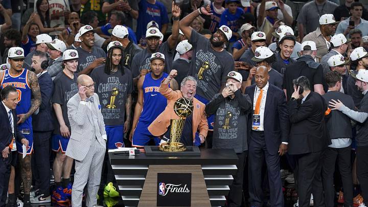 Jun 13, 2026; San Antonio, Texas, USA; The New York Knicks celebrate with the trophy after they defeat the San Antonio Spurs during game five of the 2026 NBA Finals at Frost Bank Center. Jun 13, 2026; San Antonio, Texas, USA; The New York Knicks celebrate with the trophy after they defeat the San Antonio Spurs during game five of the 2026 NBA Finals at Frost Bank Center.