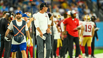 Aug 10, 2024; Nashville, Tennessee, USA;  San Francisco 49ers head coach Kyle Shanahan paces the side lines during the second half at Nissan Stadium. Mandatory Credit: Steve Roberts-USA TODAY Sports