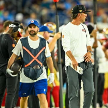 Aug 10, 2024; Nashville, Tennessee, USA;  San Francisco 49ers head coach Kyle Shanahan paces the side lines during the second half at Nissan Stadium. Mandatory Credit: Steve Roberts-USA TODAY Sports