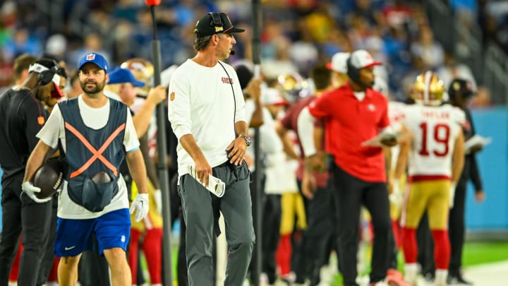 Aug 10, 2024; Nashville, Tennessee, USA;  San Francisco 49ers head coach Kyle Shanahan paces the side lines during the second half at Nissan Stadium. Mandatory Credit: Steve Roberts-USA TODAY Sports