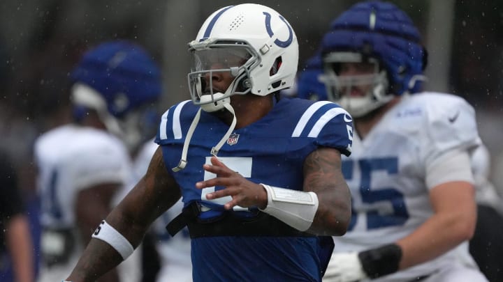 Indianapolis Colts quarterback Anthony Richardson (5) warms up in the rain during a joint practice with the Arizona Cardinals on Thursday, Aug. 15, 2024, at Grand Park Sports Complex in Westfield.