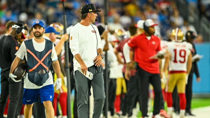 Aug 10, 2024; Nashville, Tennessee, USA;  San Francisco 49ers head coach Kyle Shanahan paces the side lines during the second half at Nissan Stadium. Mandatory Credit: Steve Roberts-USA TODAY Sports