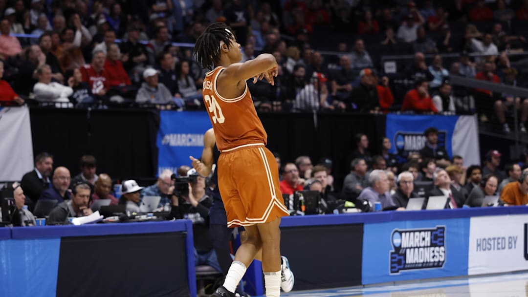 Mar 19, 2025; Dayton, OH, USA; Texas Longhorns guard Tre Johnson (20) reacts to a play in the second half against the Xavier Musketeers at UD Arena. Mandatory Credit: Rick Osentoski-Imagn Images
