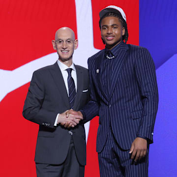 Jun 25, 2025; Brooklyn, NY, USA;  Collin Murray-Boyles stands with NBA commissioner Adam Silver after being selected as the ninth pick by the Toronto Raptors in the first round of the 2025 NBA Draft at Barclays Center. Mandatory Credit: Brad Penner-Imagn Images