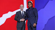 Jun 25, 2025; Brooklyn, NY, USA;  Collin Murray-Boyles stands with NBA commissioner Adam Silver after being selected as the ninth pick by the Toronto Raptors in the first round of the 2025 NBA Draft at Barclays Center. Mandatory Credit: Brad Penner-Imagn Images