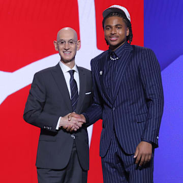 Jun 25, 2025; Brooklyn, NY, USA;  Collin Murray-Boyles stands with NBA commissioner Adam Silver after being selected as the ninth pick by the Toronto Raptors in the first round of the 2025 NBA Draft at Barclays Center. Mandatory Credit: Brad Penner-Imagn Images