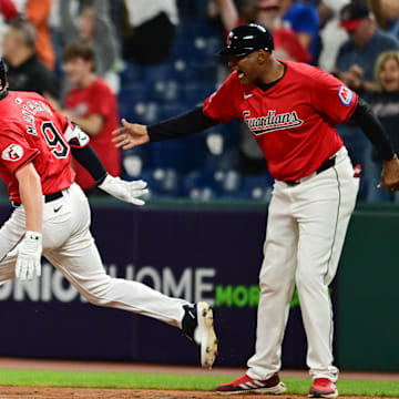 Sep 16, 2024; Cleveland, Ohio, USA; Cleveland Guardians designated hitter Kyle Manzardo (9) celebrates with first base coach Sandy Alomar Jr. (15)  after hitting a two-run home run during the eighth inning against the Minnesota Twins at Progressive Field. Mandatory Credit: Ken Blaze-Imagn Images