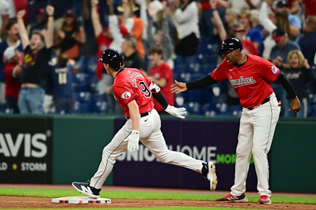 Kyle Manzardo celebrates after hitting a home run 