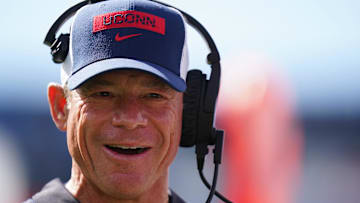 Aug 30, 2025; East Hartford, Connecticut, USA; Connecticut Huskies head coach Jim Mora watches from the sideline as they take on the Central Connecticut State Blue Devils at Pratt & Whitney Stadium at Rentschler Field. Mandatory Credit: David Butler II-Imagn Images