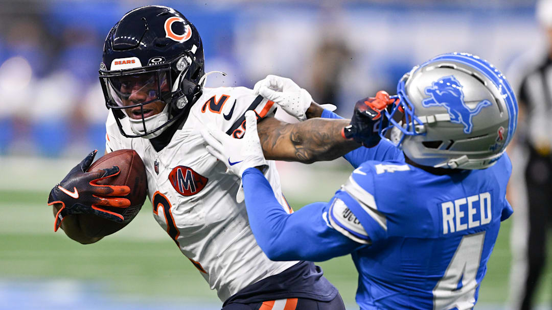 Chicago Bears wide receiver DJ Moore (2) carries the ball defended by Detroit Lions cornerback D.J. Reed (4) during the first quarter of the game at Ford Field.