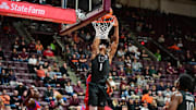 Feb 5, 2025; Blacksburg, Virginia, USA;  Virginia Tech Hokies forward Tobi Lawal (1) goes up for a dunk against Southern Methodist Mustangs during the second half at Cassell Coliseum. Mandatory Credit: Brian Bishop-Imagn Images