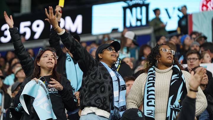 Fans cheer in the first half between NJ/NY Gotham FC and Portland Thorns FC in a 2024 NWSL Playoffs quarterfinal match at Red Bull Arena