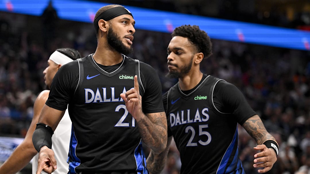 Nov 19, 2025; Dallas, Texas, USA; Dallas Mavericks forward P.J. Washington (25) and forward Daniel Gafford (21) celebrates a basket against the New York Knicks during the second quarter at the American Airlines Center. Mandatory Credit: Jerome Miron-Imagn Images