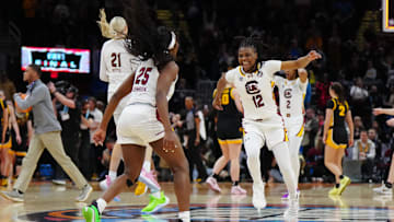 South Carolina basketball stars Raven Johnson (25), MiLaysia Fulwiley (12), Chloe Kitts (21), and Ashlyn Watkins (2)