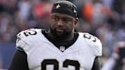 Oct 19, 2025; Chicago, Illinois, USA; New Orleans Saints defensive tackle Davon Godchaux (92) walks off the field after the game against the Chicago Bears at Soldier Field. Mandatory Credit: David Banks-Imagn Images