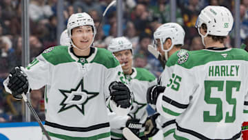 Mar 9, 2025; Vancouver, British Columbia, CAN; Dallas Stars forward Matt Duchene (95) and forward Jason Robertson (21) and forward Mikael Granlund (64) and defenseman Ilya Lyubushkin (46) and defenseman Thomas Harley (55) celebrate Robertson’s goal against the Vancouver Canucks in the third period at Rogers Arena. Mandatory Credit: Bob Frid-Imagn Images