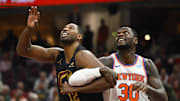 Oct 31, 2023; Cleveland, Ohio, USA; Cleveland Cavaliers center Tristan Thompson (12) and New York Knicks forward Julius Randle (30) look to rebound in the second quarter at Rocket Mortgage FieldHouse. Mandatory Credit: David Richard-Imagn Images