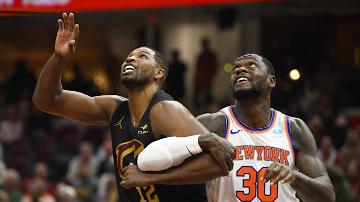 Oct 31, 2023; Cleveland, Ohio, USA; Cleveland Cavaliers center Tristan Thompson (12) and New York Knicks forward Julius Randle (30) look to rebound in the second quarter at Rocket Mortgage FieldHouse. Mandatory Credit: David Richard-Imagn Images