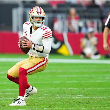 Nov 16, 2025; Glendale, Arizona, USA; San Francisco 49ers quarterback Brock Purdy (13) prepares to throw the ball in the third quarter against the Arizona Cardinals at State Farm Stadium. Mandatory Credit: Joe Camporeale-Imagn Images