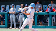 Jun 8, 2025; Chapel Hill, NC, USA;  North Carolina catcher Luke Stevenson (44) hits the ball during the seventh inning of the Super Regionals game against Arizona in Chapel Hill, North Carolina. 