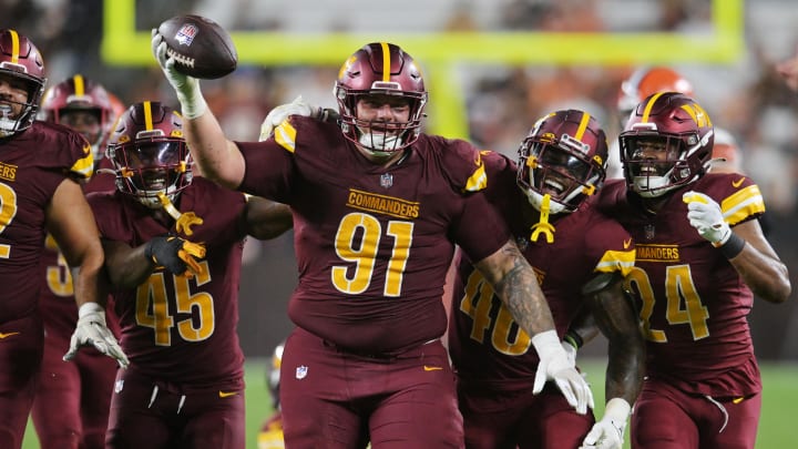 Aug 11, 2023; Cleveland, Ohio, USA; Washington Commanders defensive tackle John Ridgeway (91) celebrates after recovering a fumble during the second half against the Cleveland Browns at Cleveland Browns Stadium. Mandatory Credit: Ken Blaze-USA TODAY Sports