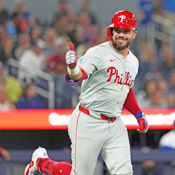 Sep 3, 2024; Toronto, Ontario, CAN; Philadelphia Phillies designated hitter Kyle Schwarber (12) gives the thumbs up sign after hitting a three-run home run against the Toronto Blue Jays during the ninth inning at Rogers Centre.