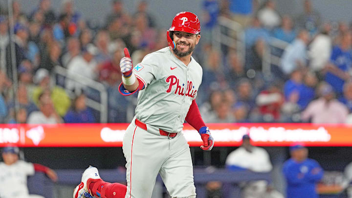 Sep 3, 2024; Toronto, Ontario, CAN; Philadelphia Phillies designated hitter Kyle Schwarber (12) gives the thumbs up sign after hitting a three-run home run against the Toronto Blue Jays during the ninth inning at Rogers Centre.