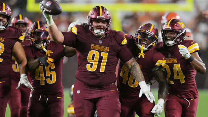 Washington defensive tackle John Ridgeway (91) celebrates after recovering a fumble against the Cleveland Browns