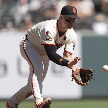 Sep 5, 2024; San Francisco, California, USA;  San Francisco Giants third base Matt Chapman (26) catches the ball during the fourth inning against the Arizona Diamondbacks at Oracle Park.