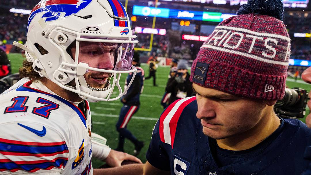 New England Patriots quarterback Drake Maye (10) meets Buffalo Bills quarterback Josh Allen (17).