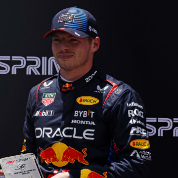 May 4, 2024; Miami Gardens, Florida, USA; Red Bull Racing driver Max Verstappen (1) poses with first place trophy the after winning the F1 Sprint Race at Miami International Autodrome. Mandatory Credit: Peter Casey-USA TODAY Sports