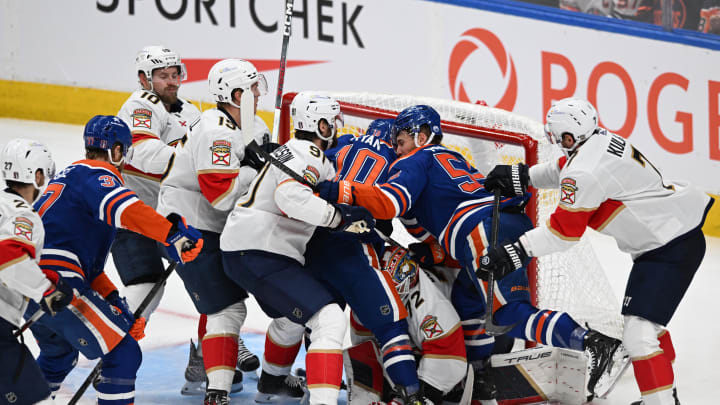 Edmonton Oilers and Florida Panthers players collide in front of the Florida Panthers goal