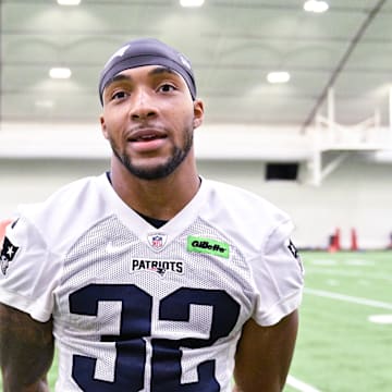 Jun 10, 2025; Foxborough, MA, USA; New England Patriots running back TreVeyon Henderson (32) speaks to the media after minicamp held in the WIN Field House at Gillette Stadium. Mandatory Credit: Eric Canha-Imagn Images