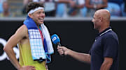 Ben Shelton is interviewed by Roger Rasheed after an Australian Open win.