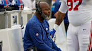 Giants defensive line coach Bryan Cox was fired during the team's bye week.