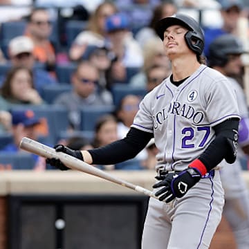 Jordan Beck of the Colorado Rockies reacts after striking out against the New York Mets