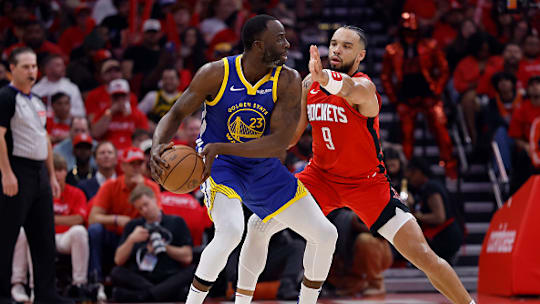 Dillon Brooks #9 of the Houston Rockets defends Draymond Green #23 of the Golden State Warriors in the first half in Game Two of the Western Conference First Round NBA Playoffs at Toyota Center on April 23, 2025 in Houston, Texas.
