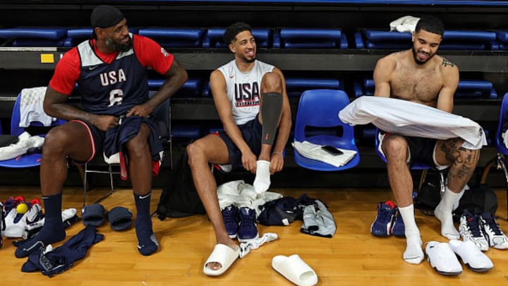 LeBron James, Tyrese Haliburton and Jayson Tatum share a laugh during USA Basketball practice during the 2024 Olympic Games in Paris.