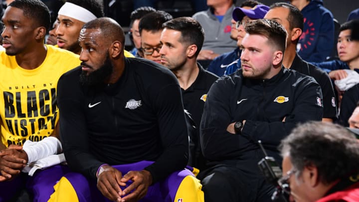 LeBron James and Luka Doncic on the Los Angeles Lakers bench. LeBron James and Luka Doncic on the Los Angeles Lakers bench.