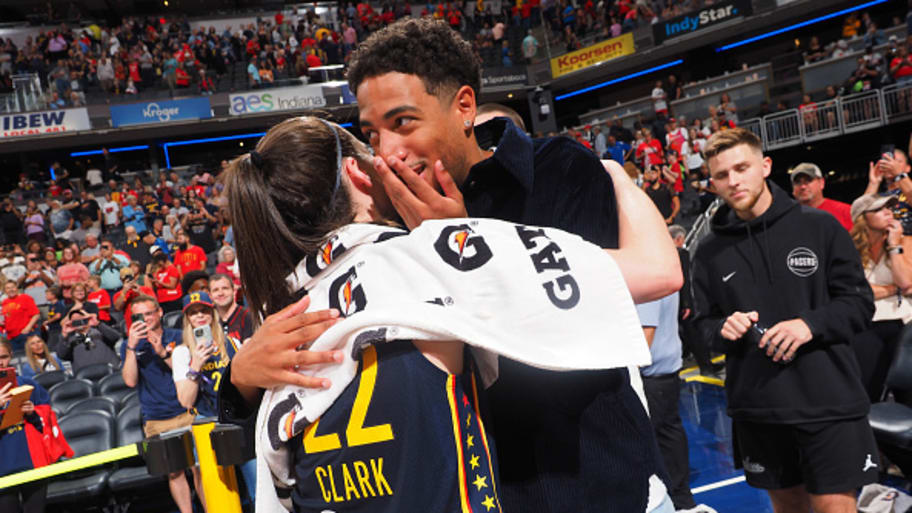 Caitlin Clark and Tyrese Haliburton after a Fever game. | Photo by Ron Hoskins / NBAE via Getty Images