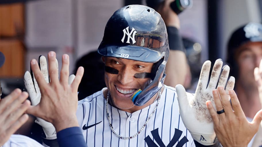 New York Yankees star Aaron Judge celebrates hitting a record-breaking home run. | Jim McIsaac/Getty Images