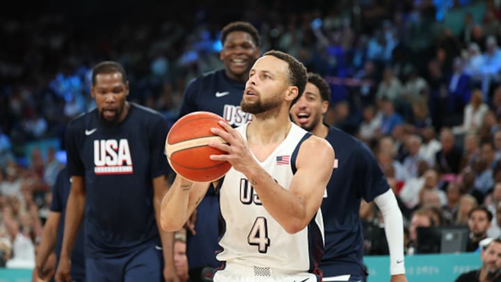 Stephen Curry #4 of Team United States shoots during a Men's basketball semifinals match between Team United States and Team Serbia on day thirteen of the Olympic Games Paris 2024 at Bercy Arena on August 08, 2024 in Paris, France. 