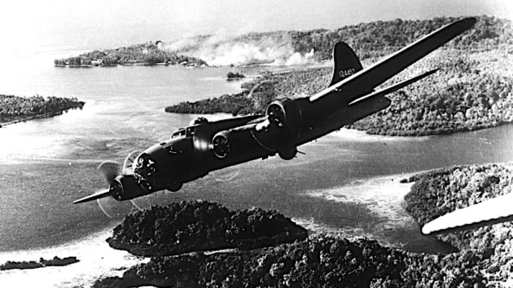 An American flying fortress enacts a maneuver against Japanese forces in the Solomon Islands during World War II.