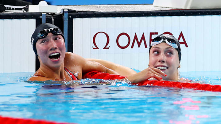 Torri Huske and Gretchen Walsh after the women's 100m fly medal race