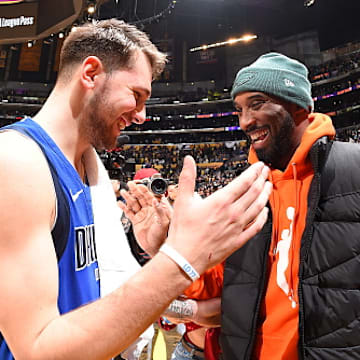 Doncic and Bryant embrace back in 2019. 