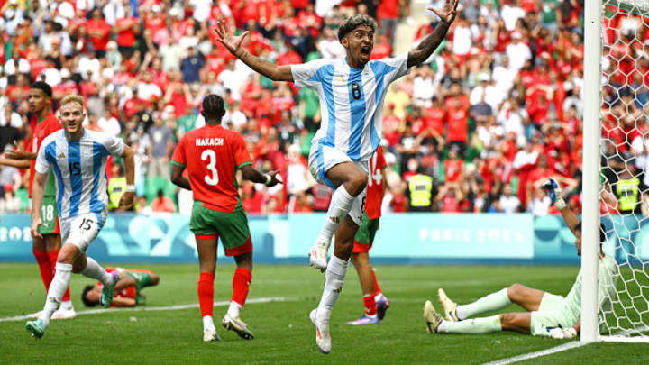 Cristian Medina of Argentina celebrates scoring his team's second goal during the Men's group B match between Argentina and Morocco during the Olympic Games Paris 2024 at Stade Geoffroy-Guichard on July 24, 2024 in Saint-Etienne, France.