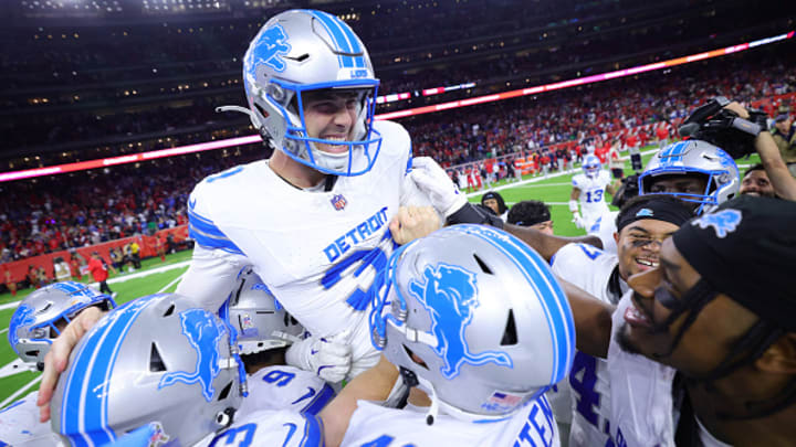 Detroit Lions kicker Jake Bates celebrates with teammates after game-winning kick against the Houston Texans. Detroit Lions kicker Jake Bates celebrates with teammates after game-winning kick against the Houston Texans.