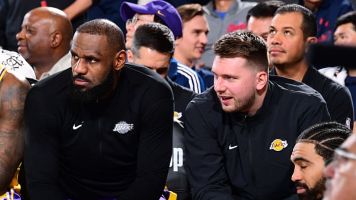 LeBron James #23 talks to Luka Doncic #77 of the Los Angeles Lakers during the game against the LA Clippers on February 4, 2025 at Intuit Dome in Los Angeles, California.